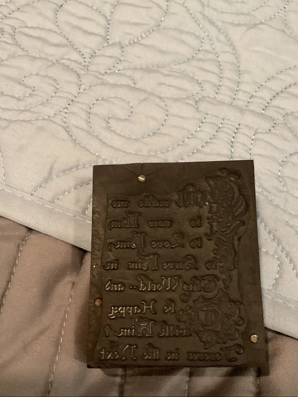 Vintage letterpress printing block.